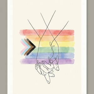 Peut inclure: Une impression d'art mural présentant un dessin au trait noir continu de deux mains qui se tiennent. Derrière les mains se trouve un motif horizontal de rayures arc-en-ciel à l'aquarelle avec une forme en chevron rose, bleu, blanc, marron et noir.