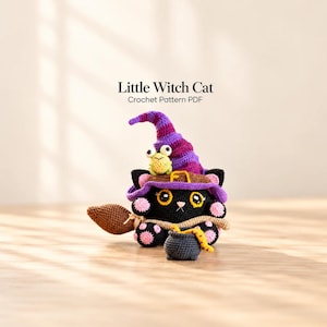 May include: A black crocheted cat wearing a purple and pink striped witch hat, featuring a small green frog on top, a brown broom, and a dark gray cauldron. The text Little Witch Cat Crochet Pattern PDF is displayed above the plush toy.
