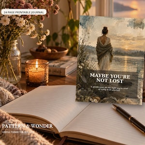 May include: A 24-page printable journal cover featuring a watercolor-style illustration of a person standing by a lake at sunset. The text reads MAYBE YOU'RE NOT LOST and A gentle reset for the night you're tired of trying to fix yourself.