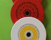 Cool vintage enamel stove top covers trivets by Finel, Arabia Wartsila, Finland
