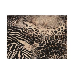 May include: A fabric featuring a high-contrast animal print pattern that combines black and tan zebra stripes on the left side with a dense, dark brown and tan leopard spot pattern covering the remainder of the textured material surface.