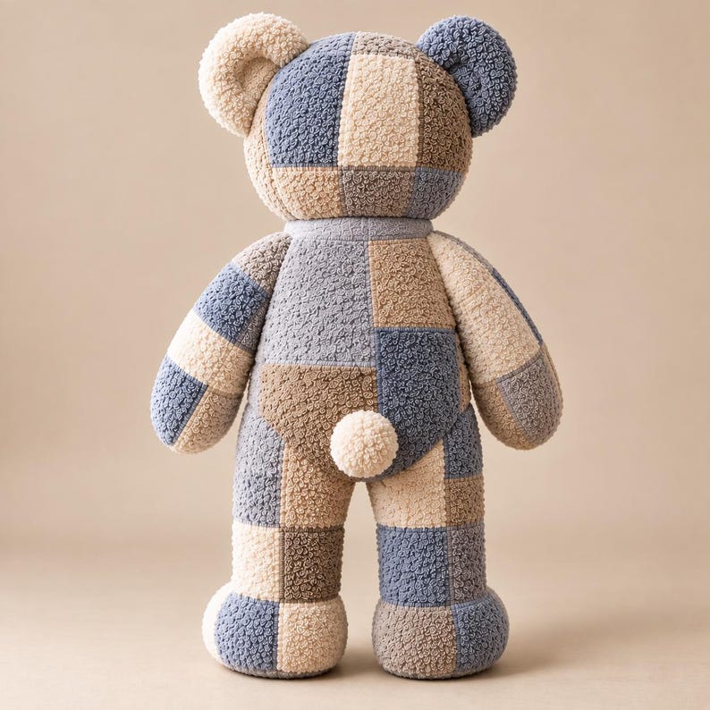 Memory bear pattern finished teddy bear shown from the back with patchwork towel panels, rounded ears, tail and segmented legs