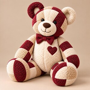 Seated red and cream patchwork memory bear made from old terry towels, showing the teddy bear shape, padded feet, arms, heart patch, and bow tie from the sewing pattern.