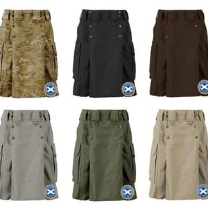 Può includere: Una collezione di sei kilt utilitari in vari colori a tinta unita e un motivo mimetico. Ogni kilt presenta un'ampia fascia in vita con passanti per cintura, finiture in metallo, tasche cargo laterali e un badge circolare Made in Scotland.
