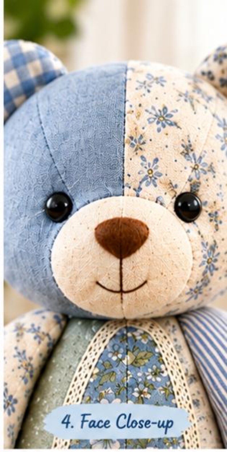 May include: A stuffed bear toy featuring a patchwork design with blue and cream fabric panels. The bear has black button eyes, a brown felt nose, and a stitched mouth. The ears are blue and white checkered, and the chest has lace trim.