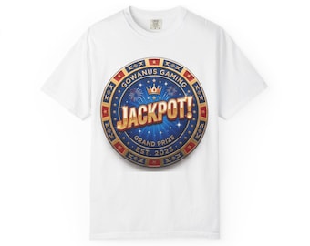 May include: A white short-sleeved t-shirt featuring a circular graphic on the chest. The design includes a blue background with gold text reading GOWANUS GAMING, JACKPOT, GRAND PRIZE, and EST. 2023, accented by a crown and fireworks.