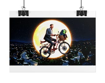 May include: A poster featuring a man in a grey suit riding a red bicycle through the night sky in front of a large yellow moon. A green alien figure sits in the front wicker basket. The scene is set above a suburban landscape at night.