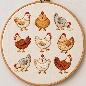 May include: A circular wooden embroidery hoop containing a piece of off-white fabric featuring nine embroidered chickens in various poses and colours, including white, brown, and grey, with red combs and wattles, arranged in a three-by-three grid.