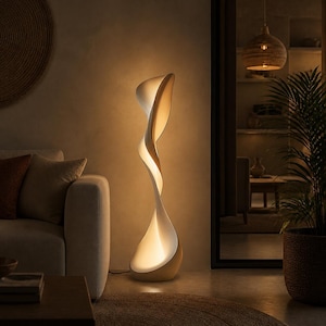 May include: A tall, sculptural floor lamp with a smooth, white, twisting, ribbon-like form that emits a warm, soft glow from within. The lamp features a continuous, fluid silhouette that spirals upward from a wider base to a narrower top.