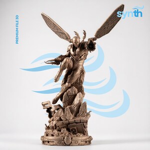 May include: A bronze-colored figurine of a winged humanoid character in a dynamic pose, standing on a rocky base with debris. The figure features intricate armor, extended wings, and a weapon on one arm. Text reads PREMIUM FILE 3D and synth.