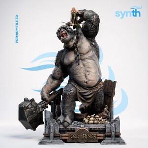 May include: A detailed 3D figurine of a large, grey, muscular troll holding a heavy stone hammer, with a small elf archer standing on its shoulder. The base features the text "LORD OF THE RINGS" and "PREMIUM FILE 3D" with "synth" branding.