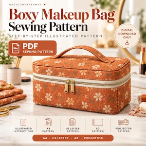 May include: A boxy makeup bag sewing pattern featuring a digital download PDF. The bag is orange with a white daisy floral print, a top handle, and a gold-toned zipper. Text includes "Boxy Makeup Bag Sewing Pattern" and "Digital Download Only."