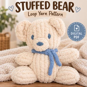 May include: A cream-colored stuffed bear made of loop yarn with blue eyes, a blue nose, and a blue scarf. The text STUFFED BEAR Loop Yarn Pattern is displayed above the bear, and a circular badge indicates it is a DIGITAL PDF file.