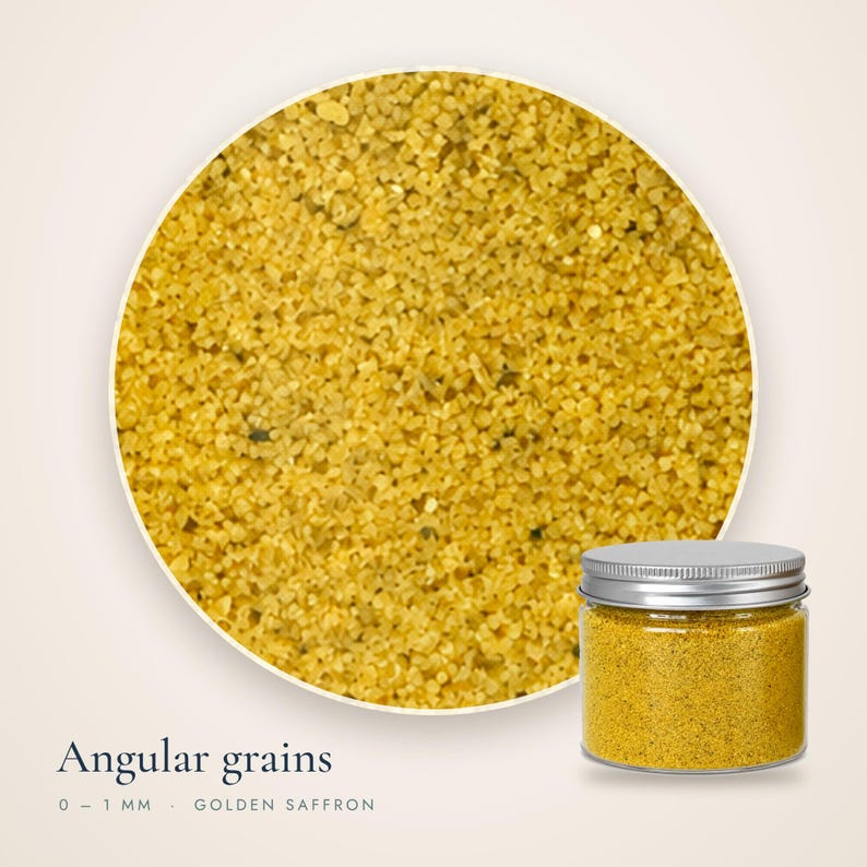 Close-up view of angular 0-1 mm Golden Saffron colored quartz sand grains next to a clear plastic jar with a metal lid for dry terrarium styling.