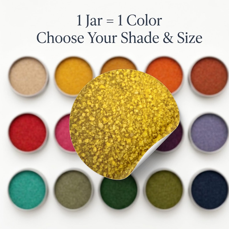 Close-up circle of Golden Saffron yellow quartz sand with a peeling sticker effect, placed over a grid of 15 open tins showing the full range of sand colors, from beige, yellow, orange and red to pink, purple, lavender, teal, greens and navy. Text: 1 Jar = 1 Color, Choose Your Shade and Size.