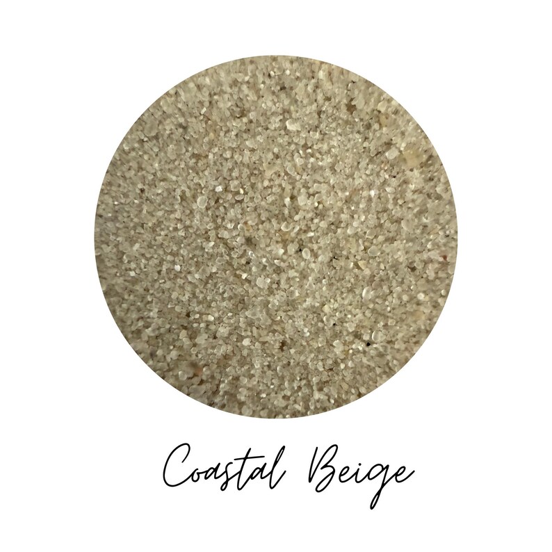 Close-up of Coastal Beige colored quartz sand showing fine mineral grain texture
