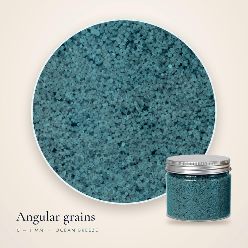 Close-up of Ocean Breeze craft sand showing angular teal grains 0 to 1 mm, with a small closed jar in the corner