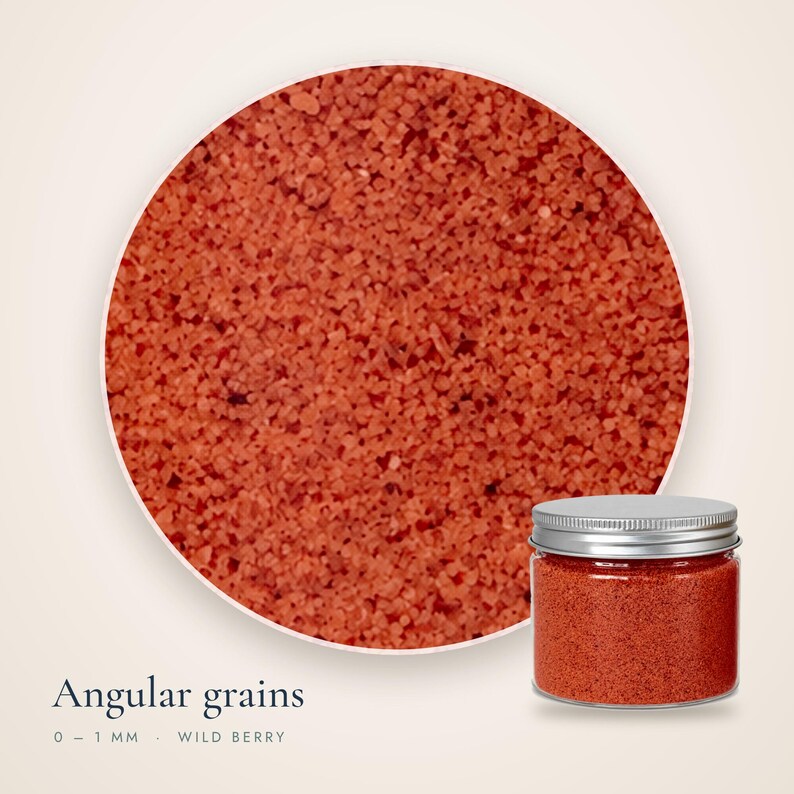 Close-up view of angular 0-1 mm Wild Berry colored quartz sand grains next to a clear
plastic jar with a metal lid.