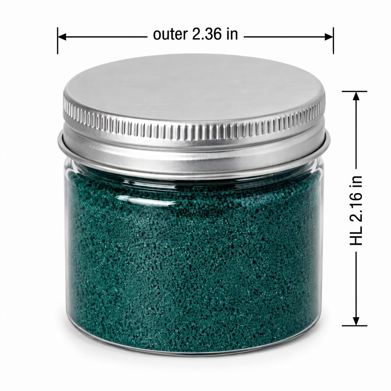 Closed clear jar of deep teal green colored quartz sand with a silver metal screw lid, with measurement lines showing an outer diameter of 2.36 in (6 cm) and a height of 2.16 in (5.5 cm), on a white background.