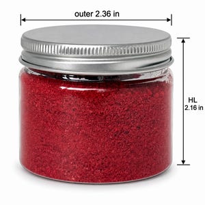 Closed clear jar of red colored quartz sand with a silver metal screw lid, with measurement lines showing an outer diameter of 2.36 in (6 cm) and a height of 2.16 in (5.5 cm), on a white background.
