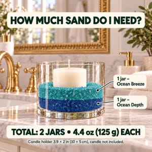 Sand quantity guide showing a glass candle holder with a white pillar candle, filled with two layers of quartz sand, one jar each: Ocean Depth dark blue at the bottom and Ocean Breeze teal on top. Text: total 2 jars, 4.4 oz (125 g) each, candle holder 10 x 5 cm (3.9 x 2 in), candle not included