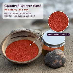 Coloured quartz sand in Wild Berry red shade, 0-1 mm grain size, displayed in a coconut
bowl on sand for sand art and dry terrariums.
