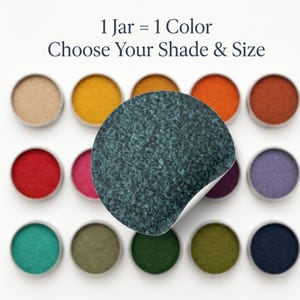 Caribbean Reef teal quartz sand highlighted among multiple colored sand shades with the text ‘1 Jar = 1 Color, Choose Your Shade & Size