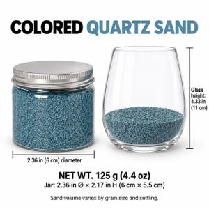 Closed clear jar of dusty teal blue colored quartz sand with a silver metal screw lid, next to a stemless wine glass with a layer of the same sand at the bottom. Text: Colored Quartz Sand, Net Wt. 125 g (4.4 oz), jar 2.36 in diameter x 2.17 in high (6 x 5.5 cm), glass height 4.33 in (11 cm), sand volume varies by grain size and settling.