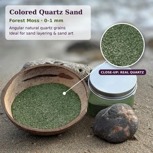 Coconut shell bowl of Forest Moss green sand and a closed jar on a beach, with a close-up circle of the quartz grains