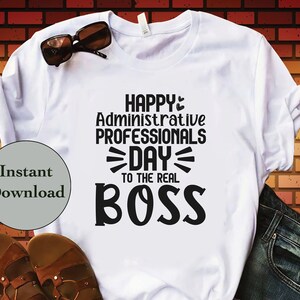 May include: White t-shirt with black text that reads "Happy Administrative Professionals Day to the Real Boss".