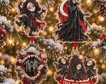 May include: Four acrylic ornaments featuring dark fantasy illustrations. One shows a hooded figure in a mask, another a singer in a black gown, one a floral frame with a sharp logo, and the last three figures with the text TREE-SIDE RITUAL.