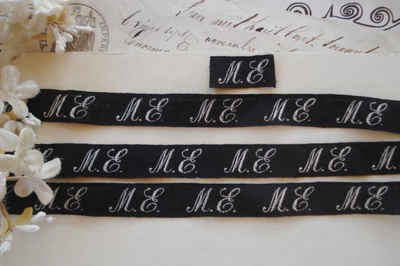 1 Antique French White Black Fancy Script Monogram Initial Letter "ME" Silk Satin Applique Textile Dress Maker Label Millinery Ribbon Trim