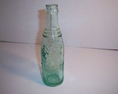 1920 39 s NuGrape Atlanta 7 5 8 inches tall 6 Fl ozs aqua Deco soda bottle
