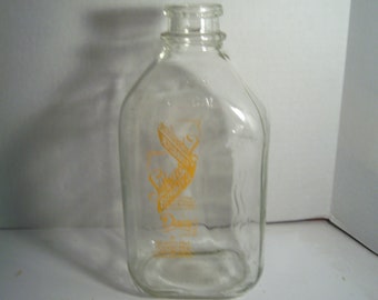 1969 Suburban Burbeck Dairy Chelmsford Mass Orange Pyro 10 1/4 inch tall Clear 1/2 Gallon milk bottle