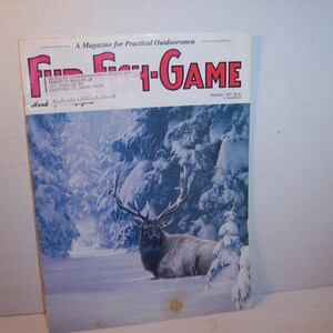 May include: A vintage "Fur-Fish-Game" magazine cover featuring a majestic elk in a snowy forest. The magazine title is in red and white, with the text "A Magazine for Practical Outdoorsmen". The cover is dated December 1987.