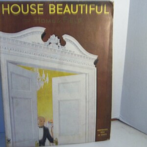 May include: A vintage magazine cover for House Beautiful magazine, featuring a white door with a gold-colored chandelier visible through the open doorway. The cover text reads "House Beautiful" and "For Homes New". The magazine is dated November 1933 and costs 35 cents.