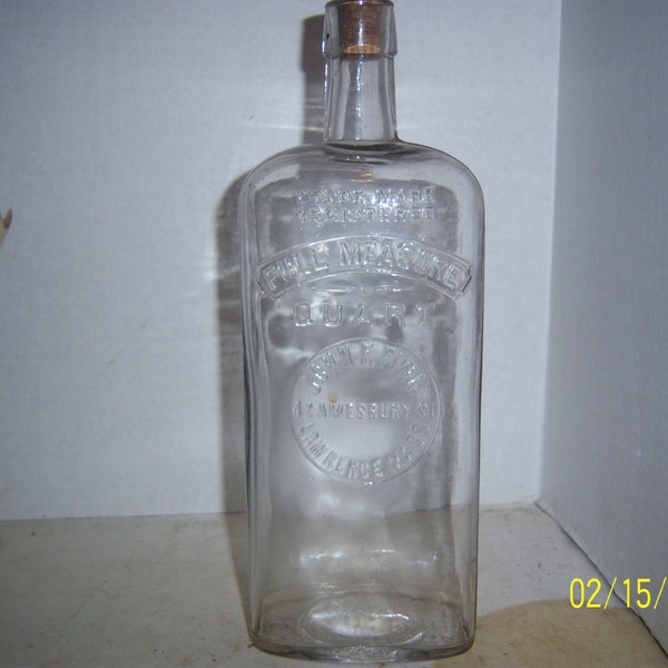 1890's John Finn Lawrence, Mass 10 3/8 inch tall Clear whiskey  Bottle Flask