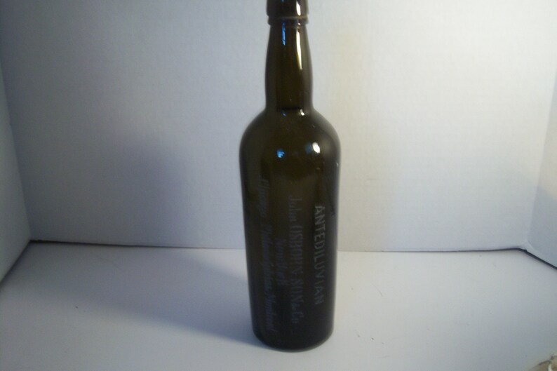 1890's John Osborn Antediluvian New York Chicago Philada Montreal Etched Olive Green 11 3/8 inch tall Liquor Whiskey Bottle Cylinder image 1