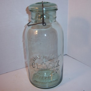 KS1 - 1920&#39;s Trade Mark Climax Registered Pat&#39;d July 14, 1908 Half Gallon 9 1/2 inch tall smoky light green Fruit Jar