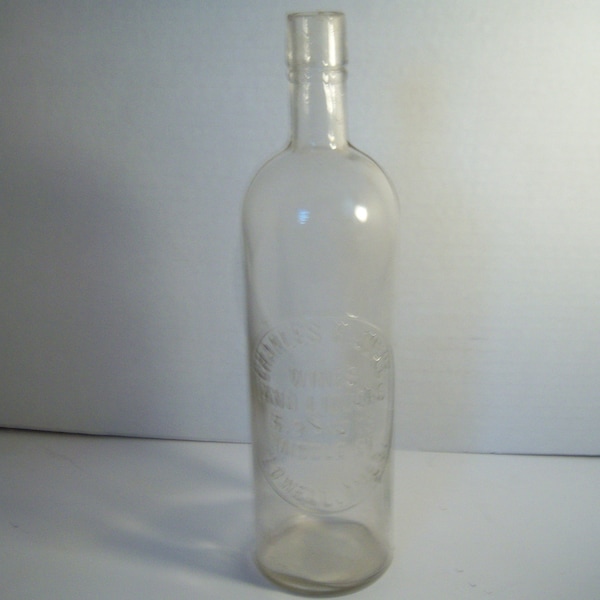 1890's Charles W. Cheney Fancy Groceries 23 Central 13 Middle St Lowell Mass  Round Clear Quart Whiskey Bottle 11 1/2  inches tall