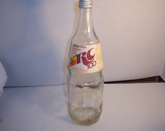 1970's Royal Crown Cola Co  RC 100 Caffeine Sugar Free Columbus Ga 32 oz Clear paper label soda bottle