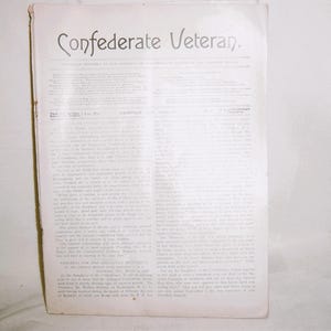 May include: A black and white magazine cover with the title "Confederate Veteran." The magazine is from the year 1911 and the issue number is 371.