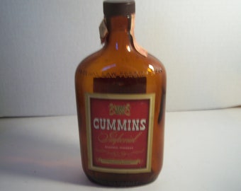 1940's Cummins Imperial Blended Whiskey Louisville KY 8 1/4 inch tall amber pint  liquor bottle