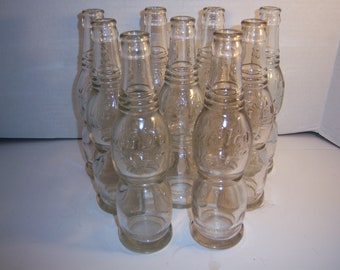 JS - 1920's  Lot of 9 Nu ICY 7 oz CLEAR Deco Soda Bottles 8 5/8 inches tall  Wedding Decor Shower