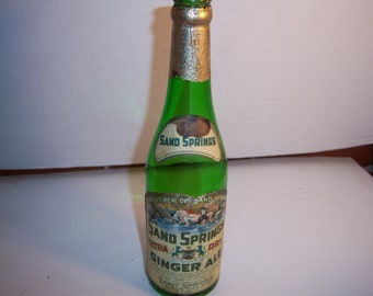 BW - 1920's Sand Springs Indians Drinking Stream Ginger Ale Williamstown, Mass 12 oz 9 2/8" Tall Aqua Soda Bottle with Paper Label