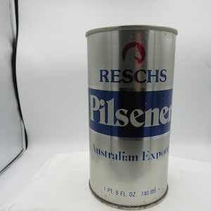 May include: A vintage Reschs Pilsener beer can. The silver can features blue and white text, including "Reschs Pilsener" and "Australian Export." It holds 1 pt. 9 fl. oz. (740 ml). A red horse head logo is at the top.