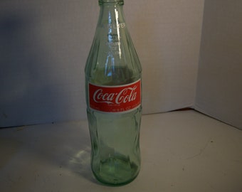 1980's Coke 16.9 oz aqua acl painted label soda bottle 9 5/8" tall