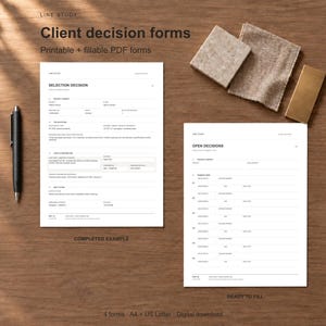 May include: Two white printable and fillable PDF client decision forms on a wooden surface. One form is labeled Selection Decision and the other Open Decisions. A black pen is placed to the left of the forms, with fabric swatches and a coffee cup nearby.