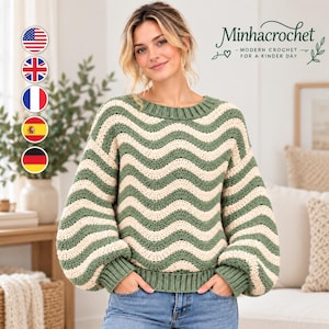 May include: A long-sleeved crochet sweater featuring a wavy, horizontal striped pattern in sage green and cream. The garment has a ribbed crew neckline, ribbed cuffs, and a ribbed hem. The text Minhacrochet - Modern Crochet for a Kinder Day is visible.