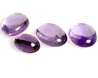 Four Oval Amethyst cabochons